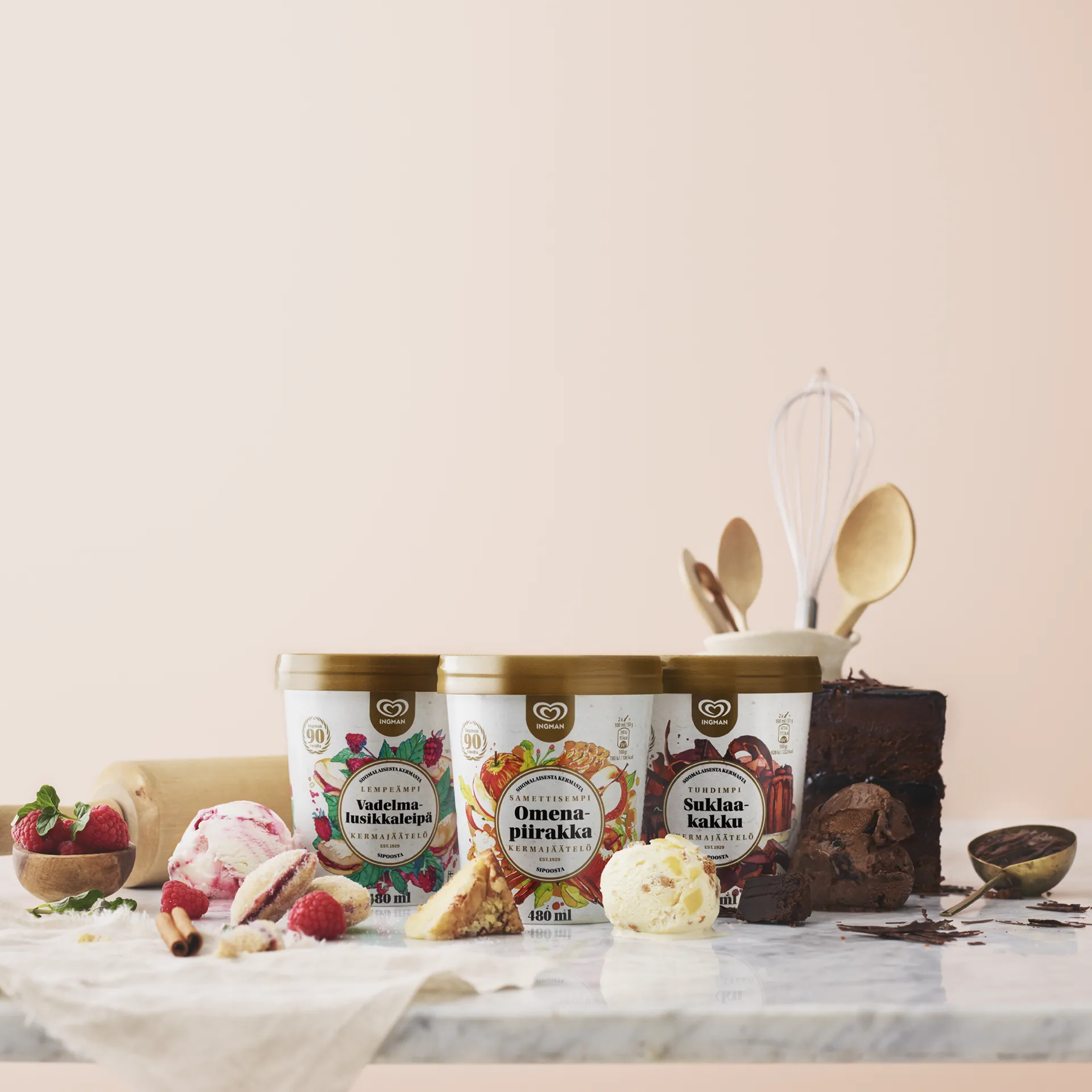 A photographed packshot for Ingman Cake Ice Creams with three flavor variants.