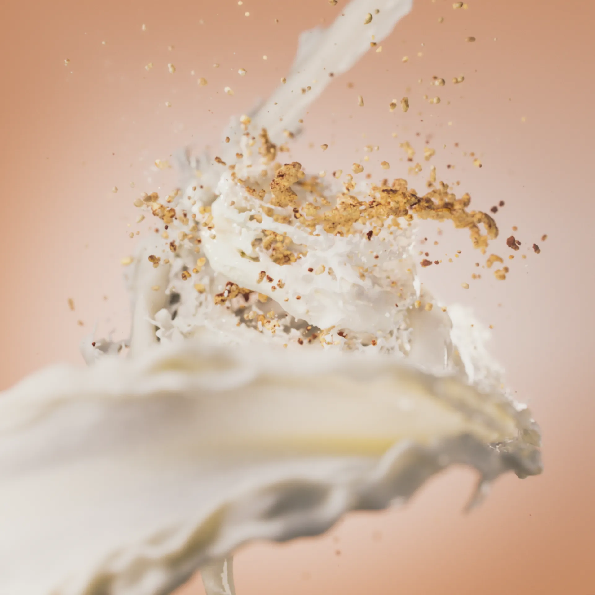 A crumbled apple pie is surrounded by swirls of cream. A still image from a 3D ice cream animation made for Ingman.