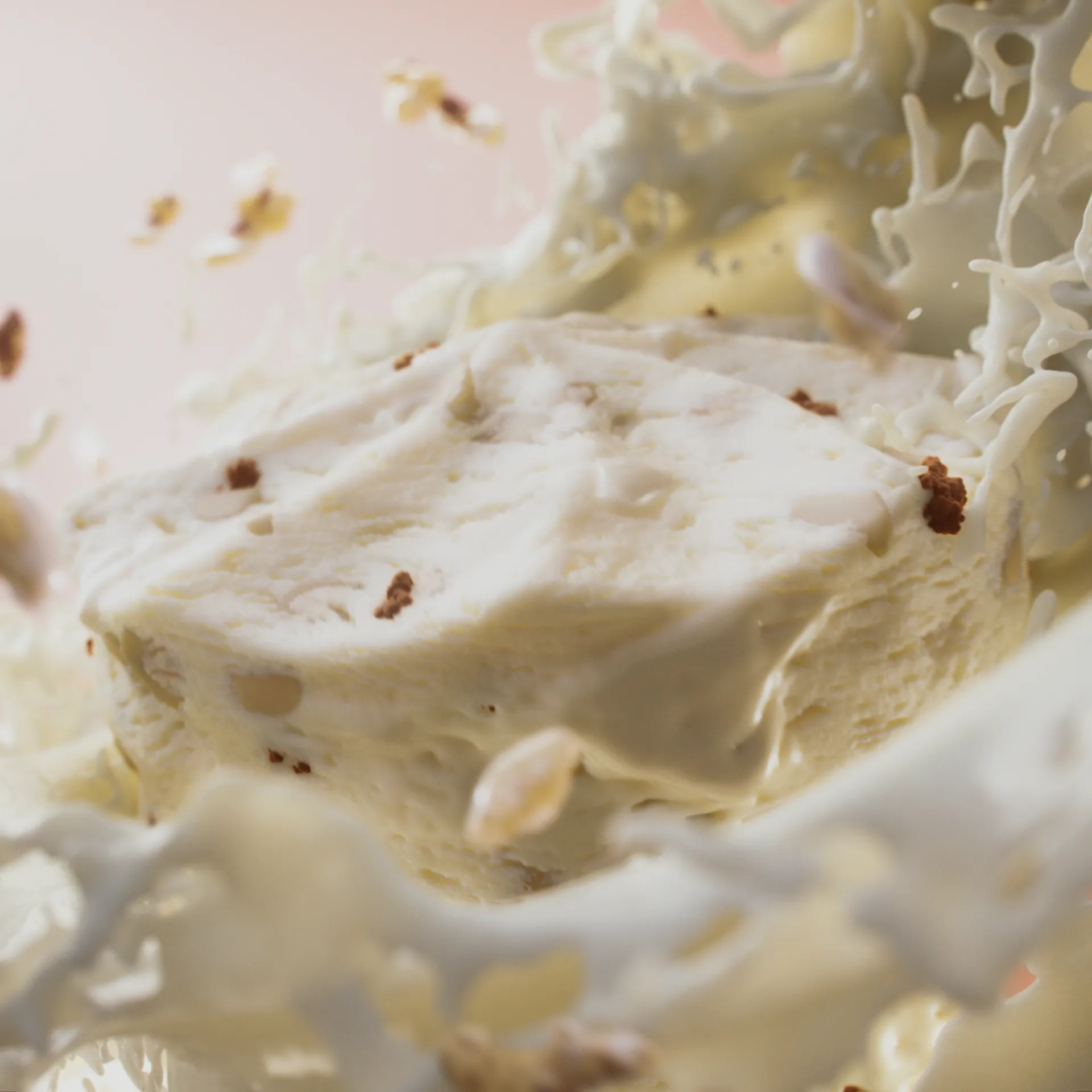 A close up image of a ice cream with pieces of apple pie. The ice cream is surrounded by swirls of cream. Still image from an animation made for Ingman Cake Ice Creams.