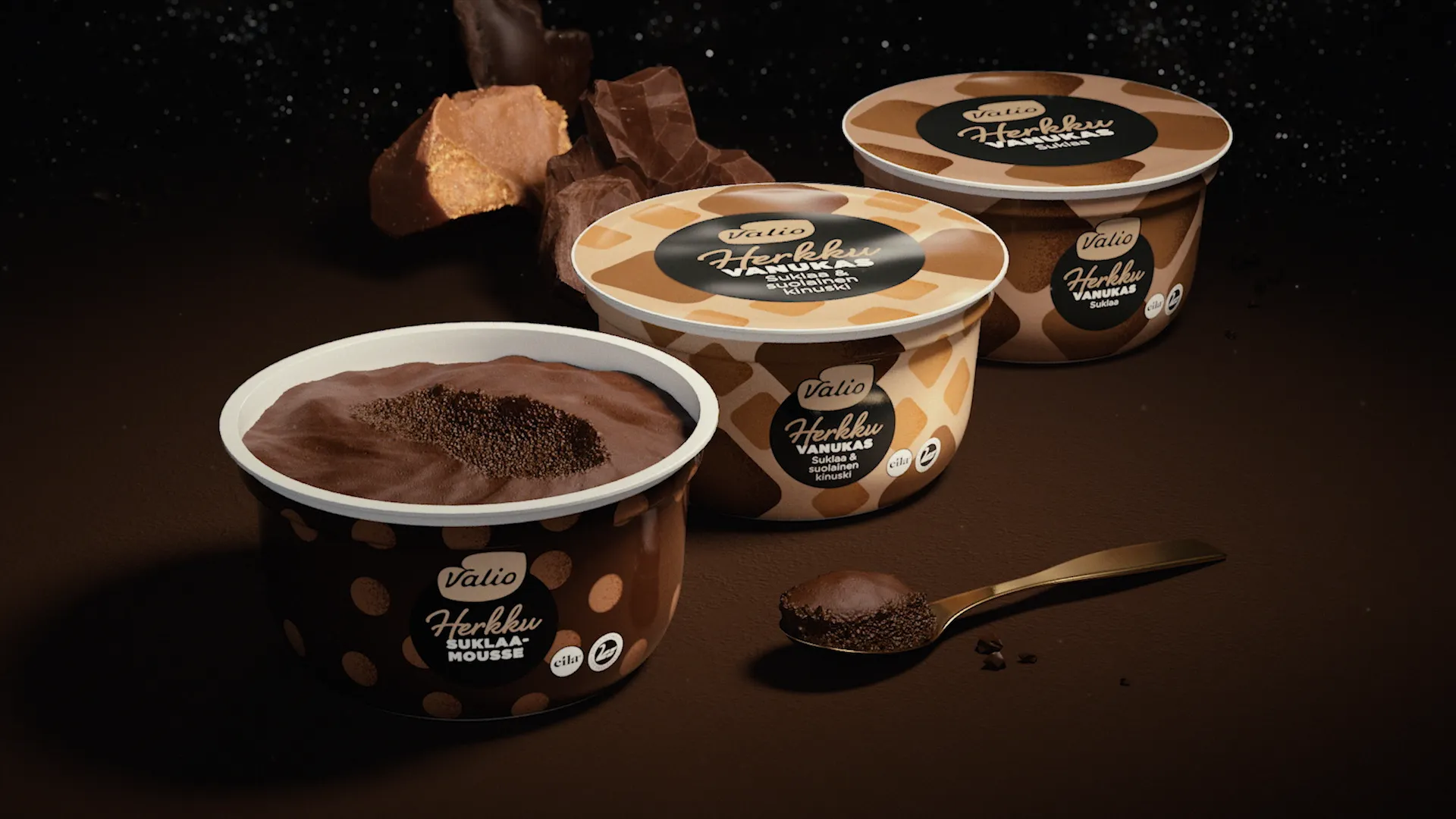 Image of three mousse desserts. Still frame from a chocolate mousse ad made for Valio Herkku.