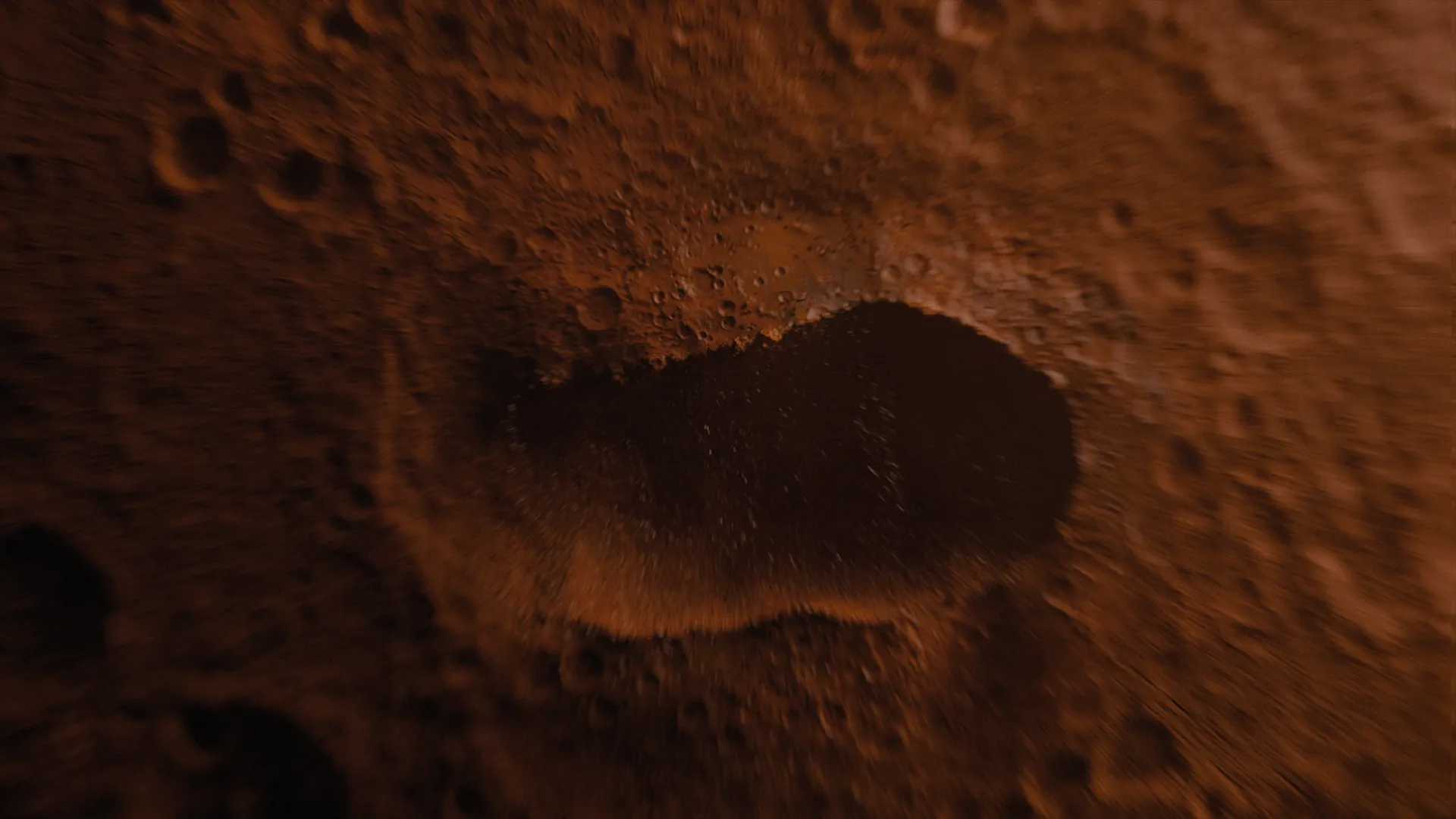 Image of a crater made out of chocolate mousse. Still frame from an animation made for Valio Herkku.