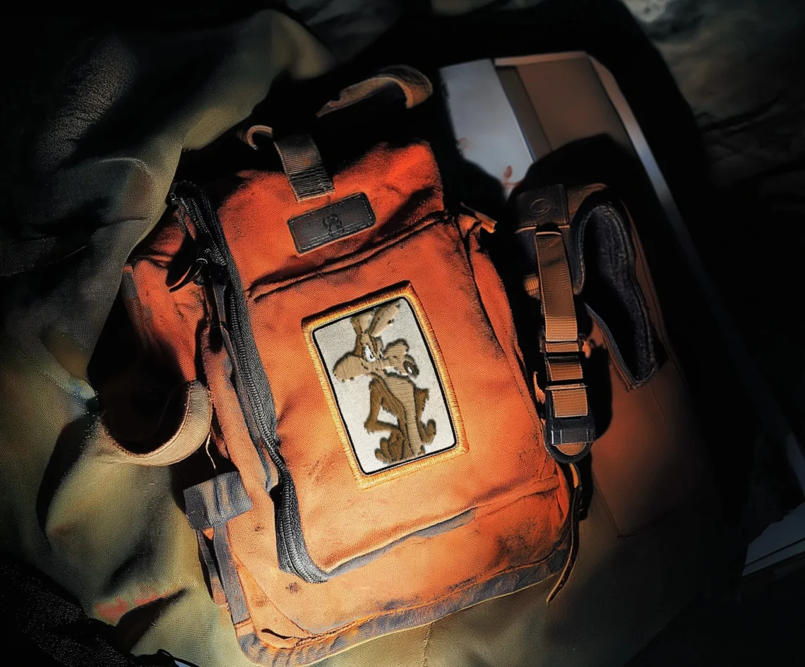 Featured image from the Brink Helsinki blog: How to create world class character animation. In the image there is a backpack, with a patch, with an embroided image of Wile E. Coyote.