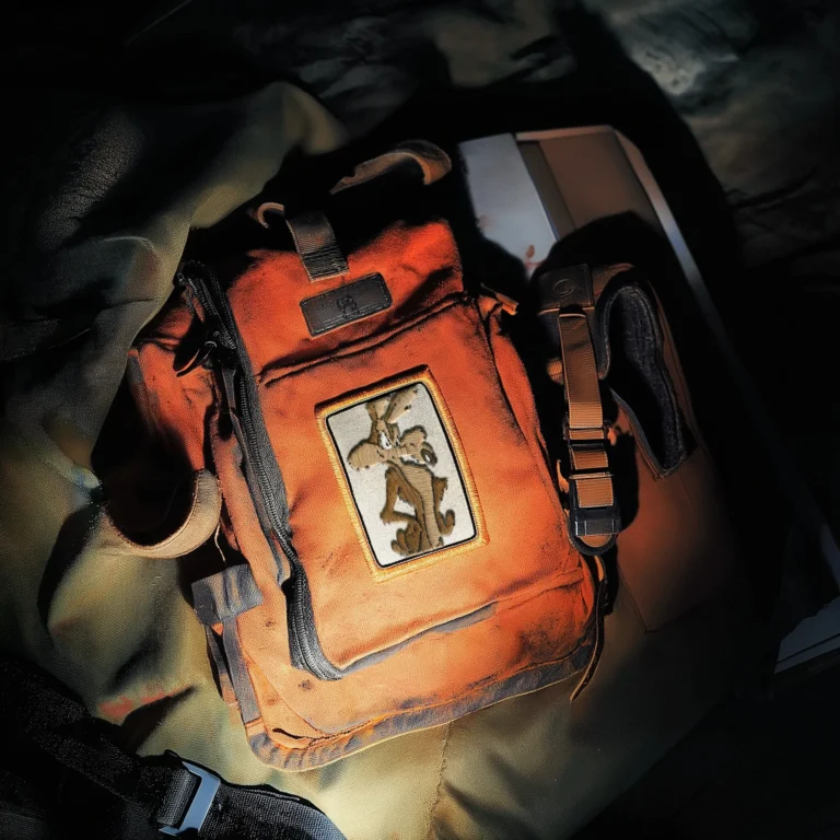 Featured image from the Brink Helsinki blog: How to create world class character animation. In the image there is a backpack, with a patch, with an embroided image of Wile E. Coyote.