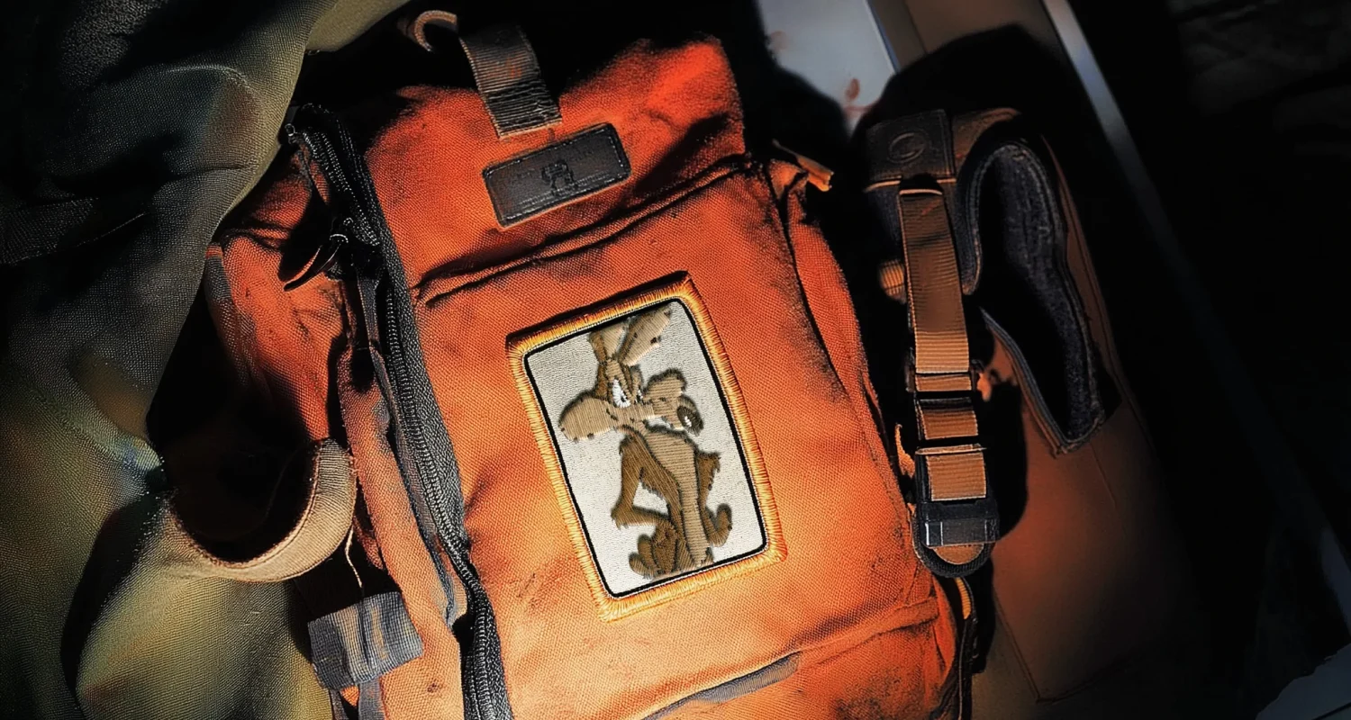 Featured image from the Brink Helsinki blog: How to create world class character animation. In the image there is a backpack, with a patch, with an embroided image of Wile E. Coyote.